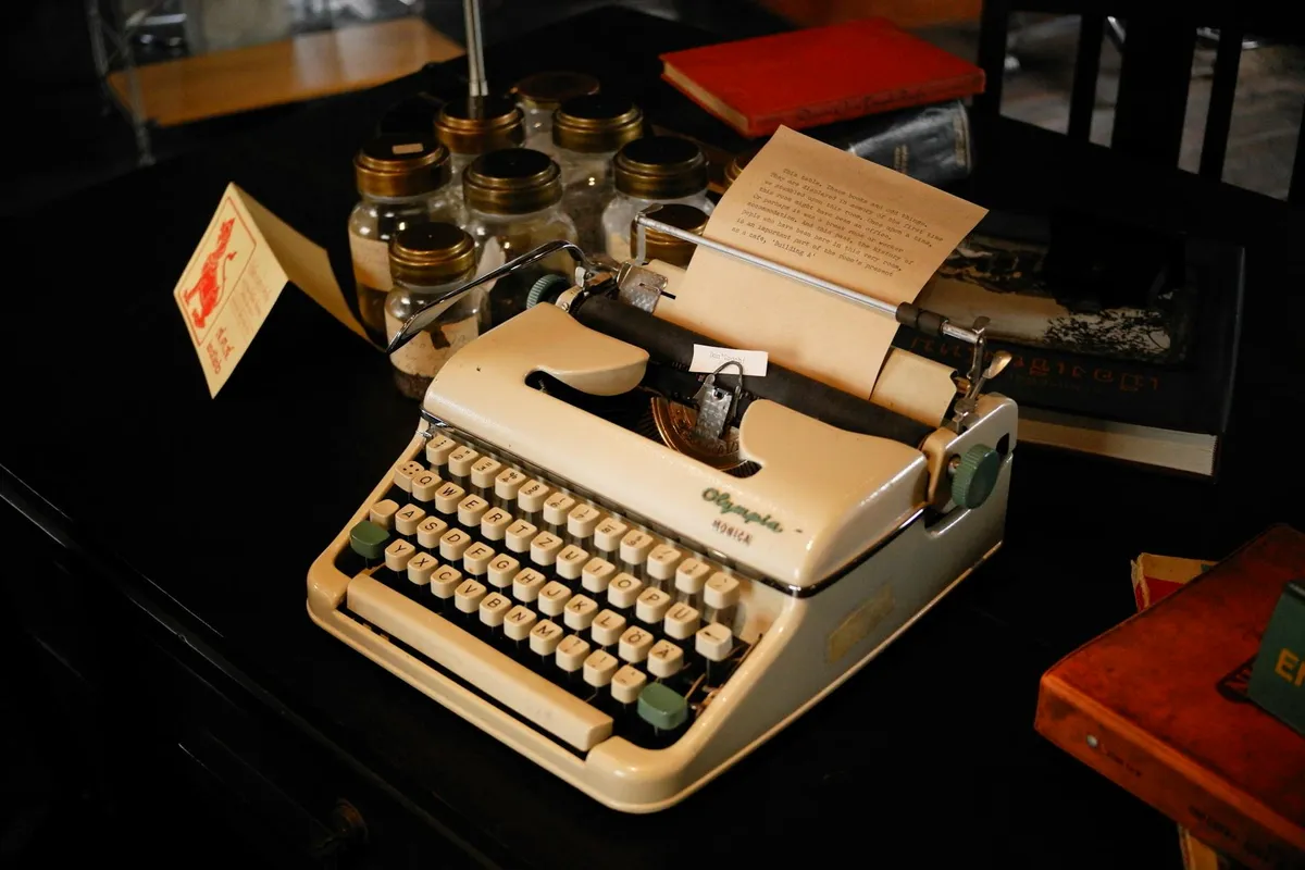 A vintage typewriter and papers